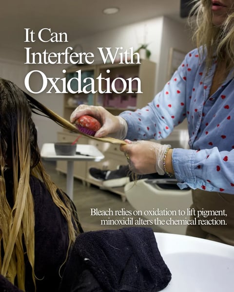 Hairdresser applying product to a clients hair with text explaining how minoxidil interferes with oxidation in bleaching